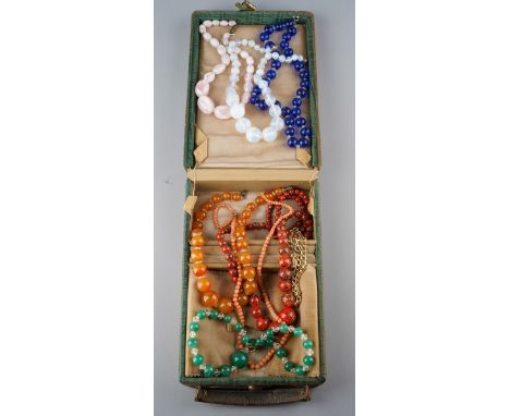 Jewellery box containing 6 glass bead necklaces and a coral necklace