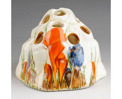 A Clarice Cliff Newport pottery flower frog decorated in the Crocus pattern, printed marks, s.d., height 6.5cm