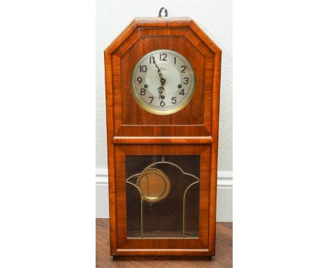 A vintage Tymo walnut cased wall clock, Arabic numerals, 8 day movement, panelled pendulum door, height 69.5cm, with pendulum