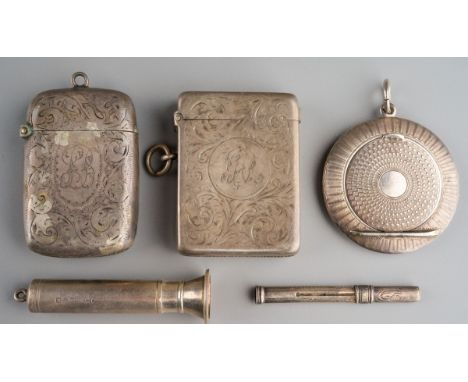 Two early 20th Century silver vesta cases, one hallmarked by William Neale, Chester, 1900, a cigar piercer, hallmarked Cheste