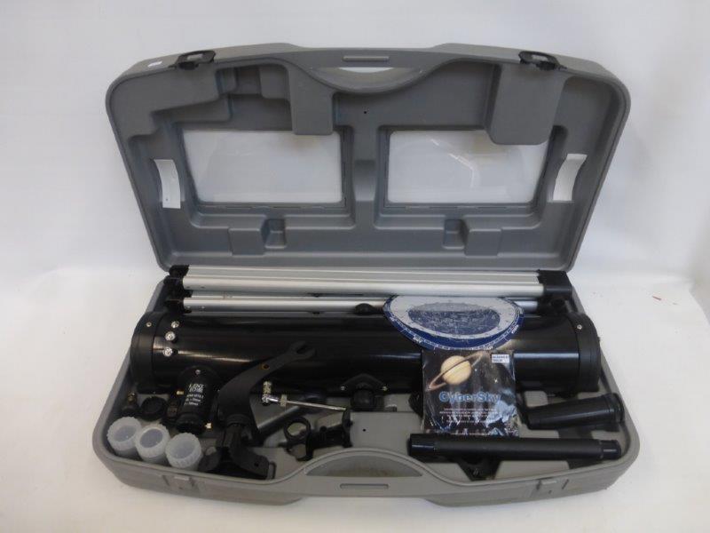 A cased Science Tech reflector telescope, 262 power.