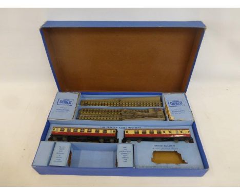 A boxed Meccano power control unit A3, a boxed Hornby No.1 footbridge with extra track, a boxed Hornby No.2 signal cabin and 
