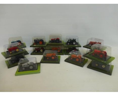 A quantity of boxed Hachette Partworker scale model tractors.