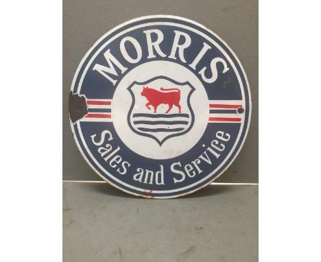 A reproduction Morris Sales and Service enamel sign of small size, 8" diameter.