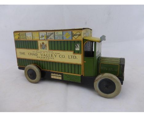 A rare clockwork tinplate Chad Valley Co. Ltd. advertising model of a delivery van, in good condition.