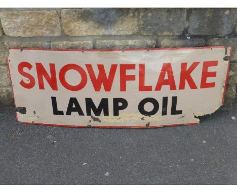A Snowflake Lamp Oil rectangular enamel sign, with amateur retouching, 48 x 18".