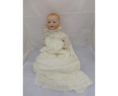A large Armand Marseille bisque headed doll stamped A.M. Germany 351/9 K, 25 1/2" tall.