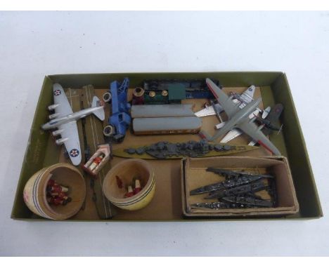 A collection of metal miniature warships and  aircraft carriers (including the Hood),a  Dinky aircraft, a Dinky LNER engine a