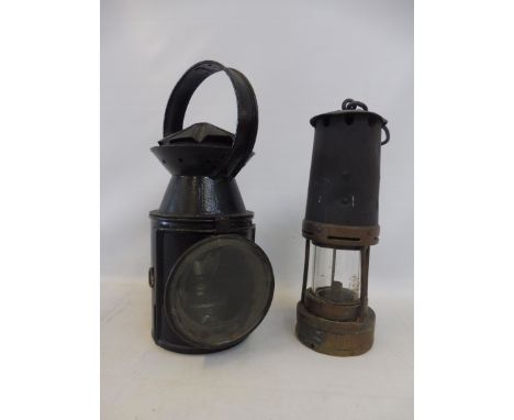 A miner's lamp and a railway lamp (2).