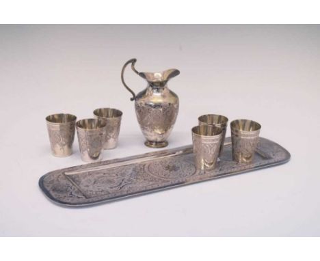 Persian (possibly Isfahan) rectangular white metal tray, cups and jug, with typical Iranian engraved decoration, tray 33cm lo