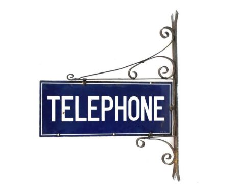 Double sided enamel sign TELEPHONE, 56cm x 23cm, with wrought-iron wall mounting bracket