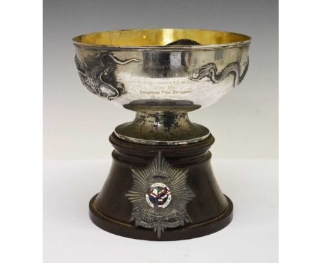 Shanghai Fire Brigade white metal presentation bowl, externally decorated in relief with a dragon, with dedication inscriptio
