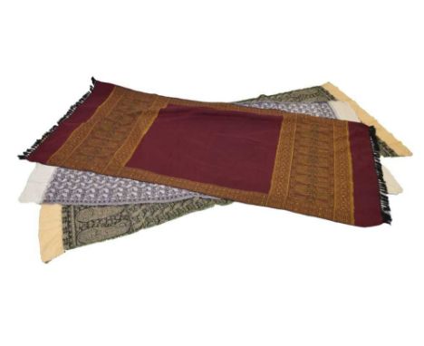 Three woven paisley design textiles, comprising: a burgundy-ground shawl with green and yellow boteh, 95cm x 199cm; cream-gro