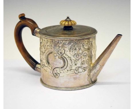 George III silver teapot of circular form with fruitwood scroll handle and later embossed rococo decoration, sponsor's mark o