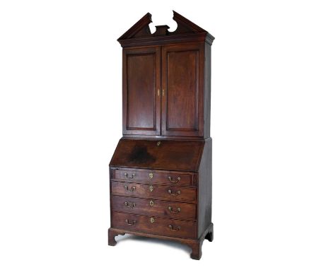 Mid 18th Century mahogany bureau cabinet, circa 1750, the upper stage with 'broken' architectural pediment over fielded panel