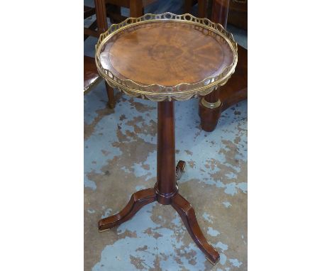 LAMP TABLE, mahogany and brass mounted with circular adjustable top, on tripod base, by Theodore Alexander, 32cm W x 72cm H. 
