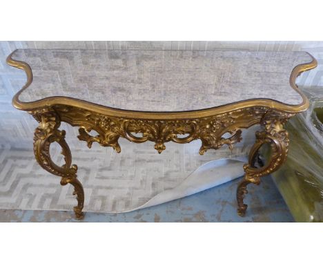 CONSOLE TABLE, Italianate with antiqued mirrored top on a gilt base, 137cm W x 48cm D x 85cm H. 