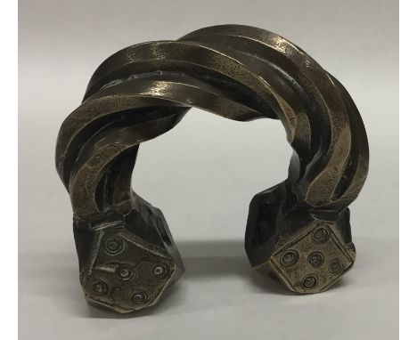 A Continental silver gilt torque bangle of twisted design. Approx. 610 grams. Est. £180 - £220.