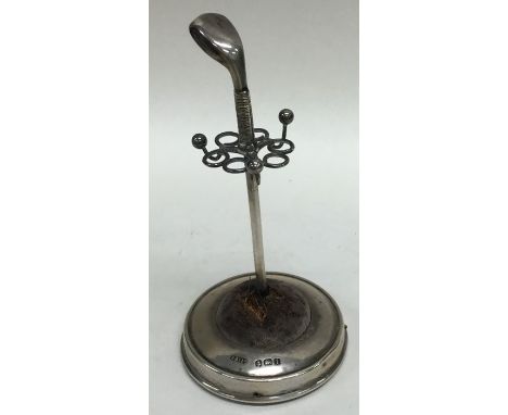 A novelty silver stick pin holder in the form of a golf club. Approx. 45 grams. Est. £50 - £80.