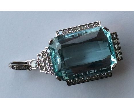 A massive aquamarine step cut pendant with diamond claw mount to loop top. Approx. 15 grams. Est. £2500 - £3000.