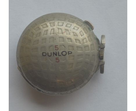 An unusual Dunlop watch in the form of a ball with hinged top. Approx. 44 grams. Est. £30 - £40.