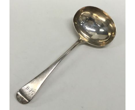 A Georgian OE pattern silver sauce ladle. Approx. 50 grams. Est. £15 - £20.