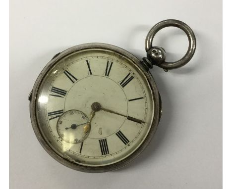 A silver open face large pocket watch decorated with engine turning. Approx. 164 grams. Est. £40 - 350.