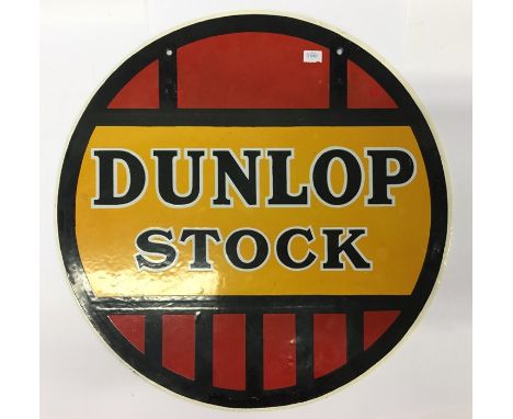 A circular "Dunlop Stock" double sided metal and enamel sign. Approx. 46 cms in diameter.