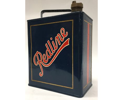 A "Redline" fuel can. (1).