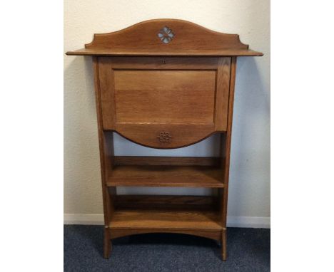 A slim fall front bureau with shelf base. Est. £20 - £30.