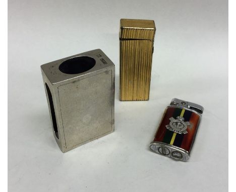 A Chinese silver match case together with a Dunhill lighter and one other. Approx. 153 grams. Est. £20 - 330.