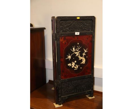 A Chinese lacquer, bone and mother-of-pearl inlaid two-fold firescreen, 14" wide x 30" high 