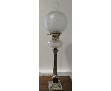 A silver plated Corinthian column oil table lamp with cut glass reservoir and etched shade, 29" highCondition:No visible issu