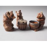 A Doulton Lambeth stoneware silver mounted three-piece cruet set, formed as bears, comprising