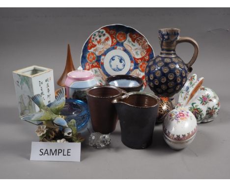 A Rhenish stoneware jug,&nbsp; two pieces St Ives Studio pottery, a number of Swarovski miniature animals, decorative eggs an