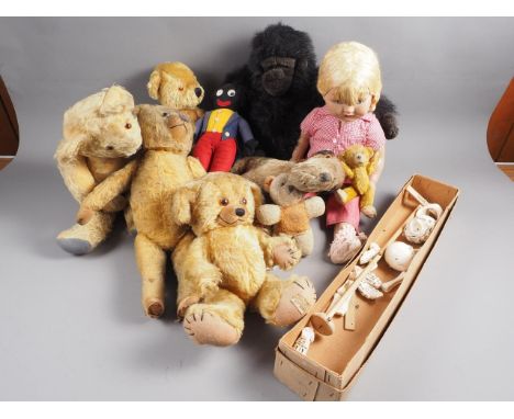 A Pelham Skeleton Puppet, in box (unstringed), a quantity of Teddy bears and a doll 