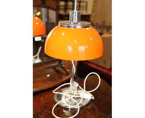 A 1970s chrome table lamp with adjustable orange shade 