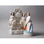 A 19th century Staffordshire watch group, "gardeners" 13" high, and a similar cricketer, 10" high