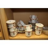 A Shelley teaset, comprising nine cups, eleven saucers, eleven side plates, one larger plate and two