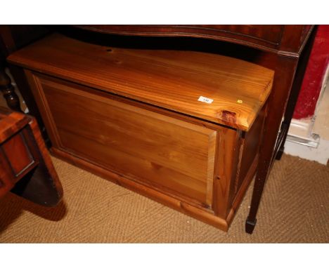 Two pine blanket boxes with panel fronts, 36" wide x 17" deep x 20" high, and a waxed pine open wall shelf, 19" wide x 6" dee