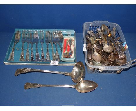 A quantity of "Kings" pattern cutlery to include: a ladle, spoons, forks, teaspoons, etc.