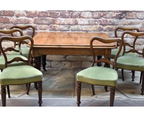 VICTORIAN WALNUT EXTENDING DINING TABLE with moulded top, rounded corners, reeded turned legs on ceramic casters, together wi