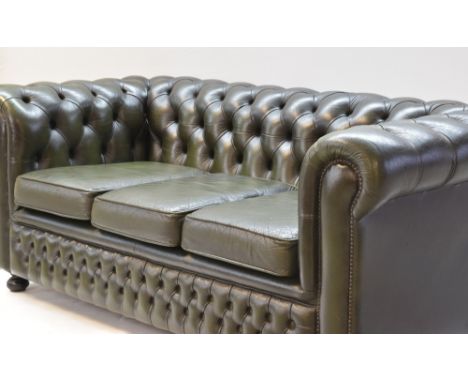 VICTORIAN-STYLE GREEN LEATHER CHESTERFIELD SOFA, button upholstered with three loose cushions, 78h x 190w x 92cms deep