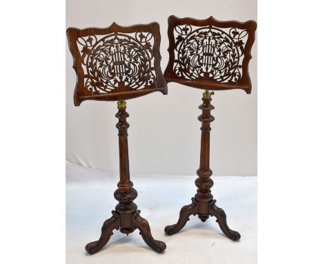 GOOD MATCHED PAIR OF VICTORIAN ROSEWOOD MUSIC STANDS, c. 1860, pierced fretwork angled rests, gilt metal adjustable and flute