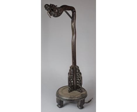 A Carved Chinese Wooden Table Lamp in the Form of a Dragons Head on Circular Base with Four Scrolled Feet, Repair to Neck, 65
