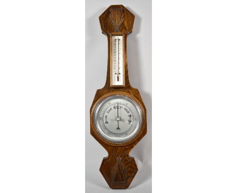 An Art Deco Oak Wall Hanging Aneroid Barometer with Thermometer, 55cm high 