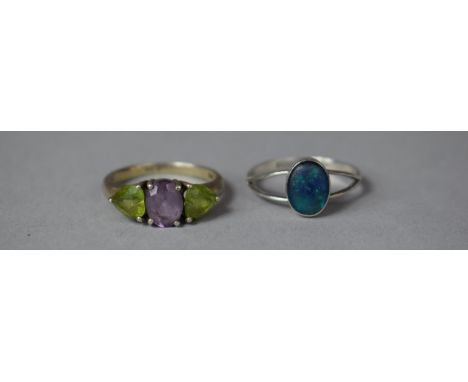 A Silver Ring Having Blue Opal Mount Together with a Silver, Amethyst and Peridot Example 