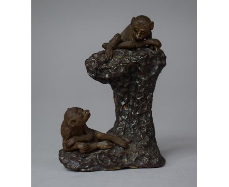 A Chinese Clay Study of Monkeys Set on Naturalist Trunk, 10cm high 