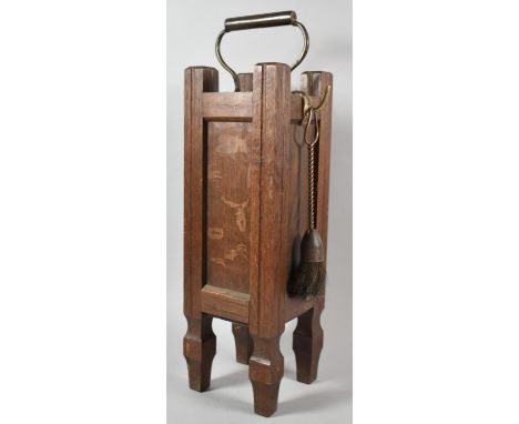 An Arts and Crafts Oak Fire Tidy Set with Brass Carrying Handle and Tools, 55cm high 