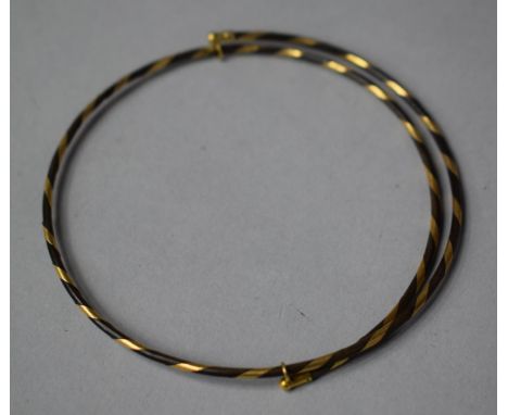 An Elephant Hair and Gold Bangle, for Strength 